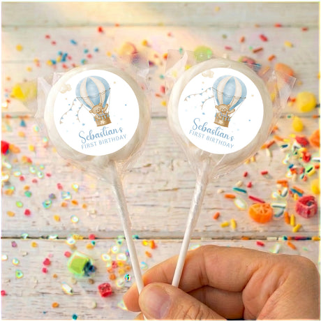 Personalised first birthday lollipops with hot air balloon labels, white sticks