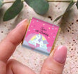 Personalised unicorn rainbow mini chocolates with pink 60th birthday label