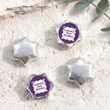 Foil-covered chocolate star candies in silver with personalised 'Birthday' topper