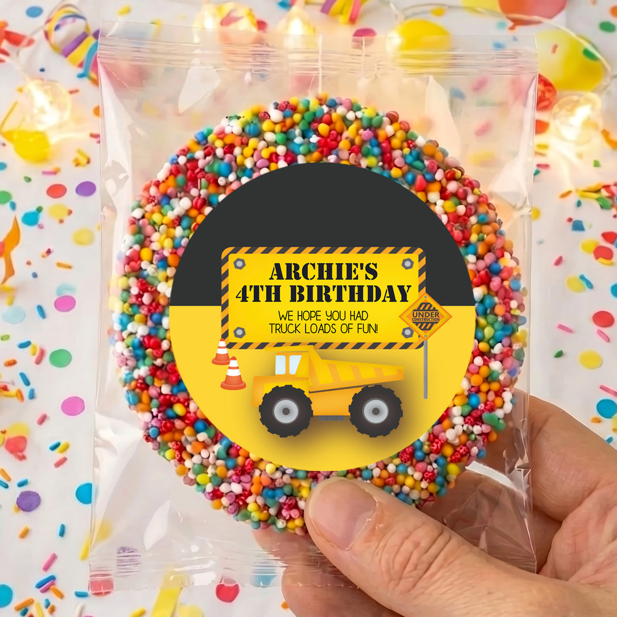 Personalised 4th birthday giant freckle badge with truck graphic and multicolor sprinkles