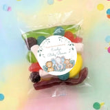 Personalised baby shower lolly bag with round sticker and sleepy safari animal illustration