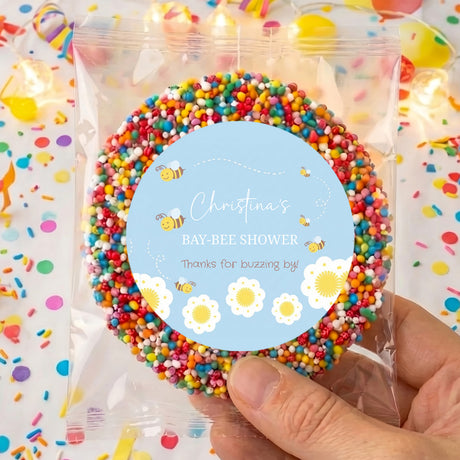 Personalised giant freckles baby shower treat with blue label and multicolor sprinkle candy