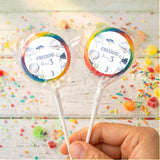 Personalised sea lollipops: two rainbow-bordered round wrappers with Freddie and age 3