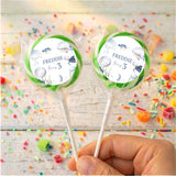Personalised sea lollipops: two green-bordered round wrappers with Freddie and age 3