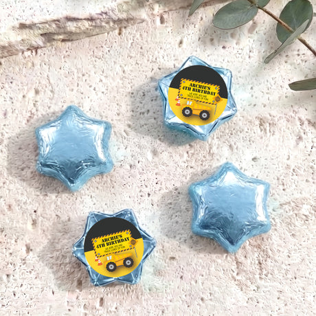 Personalised foil chocolate star with “Archie’s 4th Birthday” label, blue foil