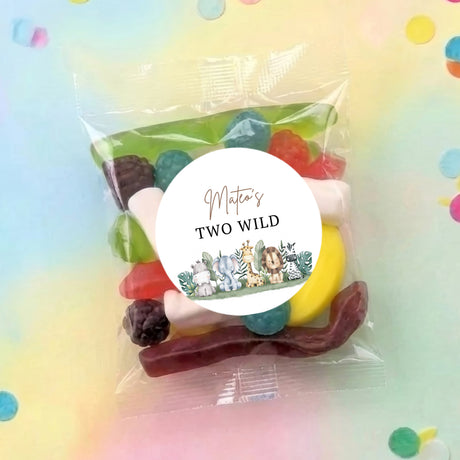 Personalised party mix lolly bag with clear wrap and colorful sweets, 'Two Wild' label