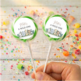 Personalised lollipop set, “A WILD ONE” labels with animal jungle graphics, green ribbon