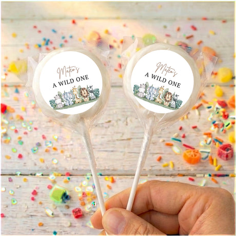 Personalised lollipop set, “A WILD ONE” labels with animal jungle graphics, clear wrapper