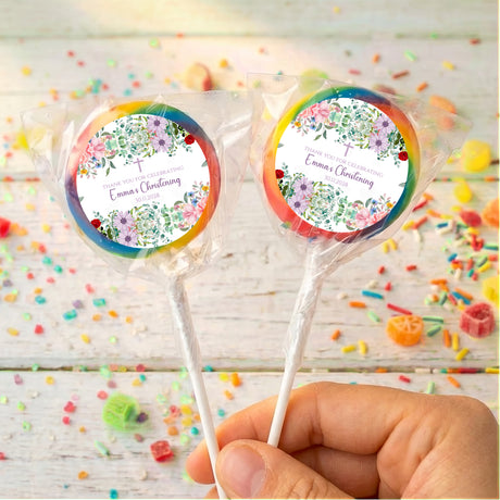 Personalised christening lollipops: two orange-yellow-edged floral round labels with names