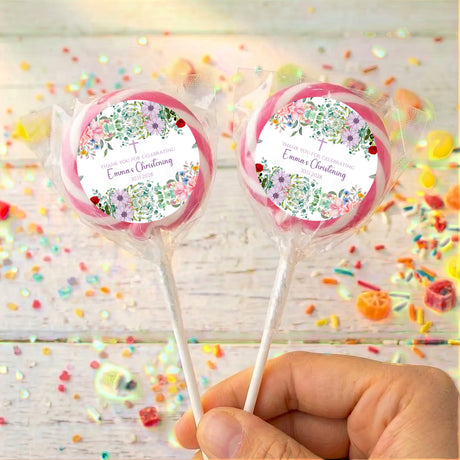 Personalised christening lollipops: two pink-edged floral round labels with names