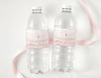 Confirmation water bottle labels on two clear plastic bottles, pink marble design and gold cross