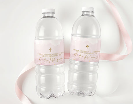 Confirmation water bottle labels on two clear plastic bottles, pink marble design and gold cross