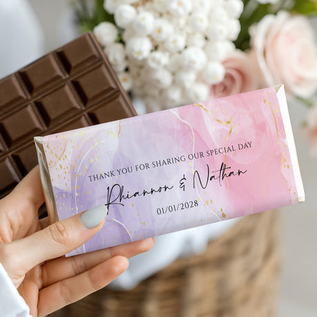 Wedding chocolate bar wrapper with pink marble design and gold speckles, thank-you text