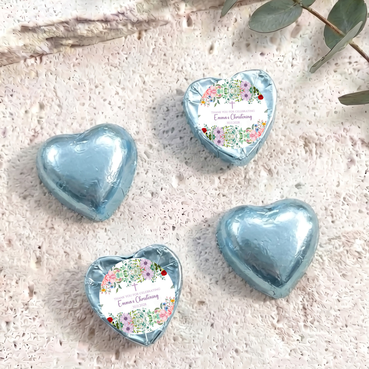 Personalised foil chocolate hearts set in light blue with floral christening label