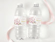 Princess castle birthday personalised water bottle labels on two clear drink bottles