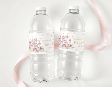 Set of two clear plastic water bottles with pink princess castle birthday labels