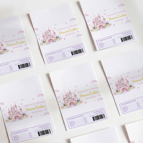 White printed chocolate wrappers with castle scene, hearts, and personal name text