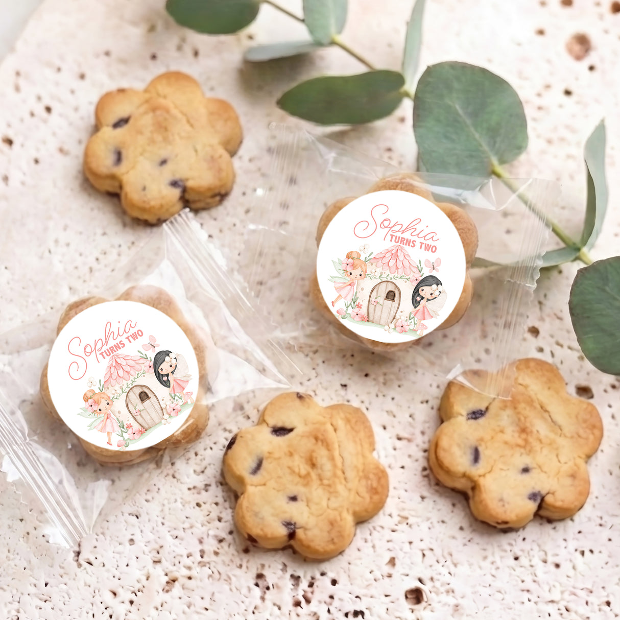 Personalised bite-size choc chip cookies with two round name stickers and assorted cookies