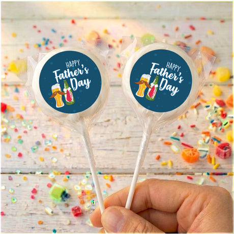 Two Father’s Day personalized lollipops with blue round labels and clear wrappers