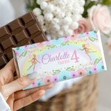 Fairy-themed chocolate bar wrapper with "Charlotte turns 4" text and pastel floral design