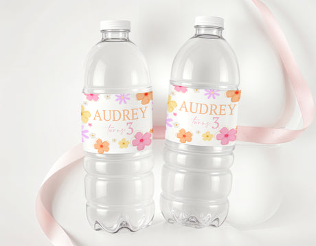 Personalised daisy water bottle labels, name Audrey with age 3 on pink floral bands