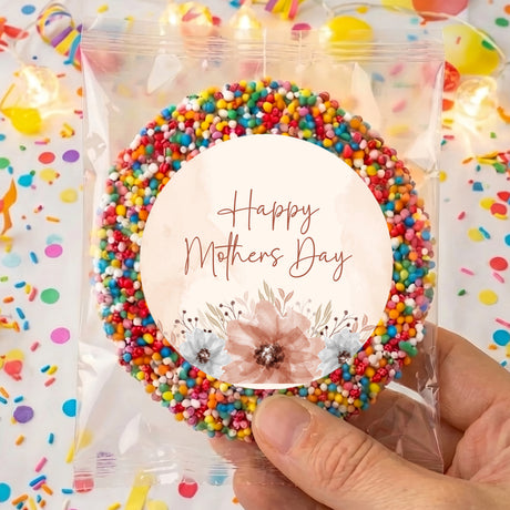 Clear plastic treat bag with round card reading Happy Mother’s Day and watercolor flowers