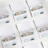 Set of white chocolate wrappers with safari animal and jungle leaf illustrations