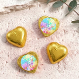Gold foil heart chocolates; one has tie-dye personalized print
