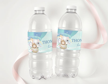 Personalised water bottle label set with blue safari hot air balloons on clear bottles