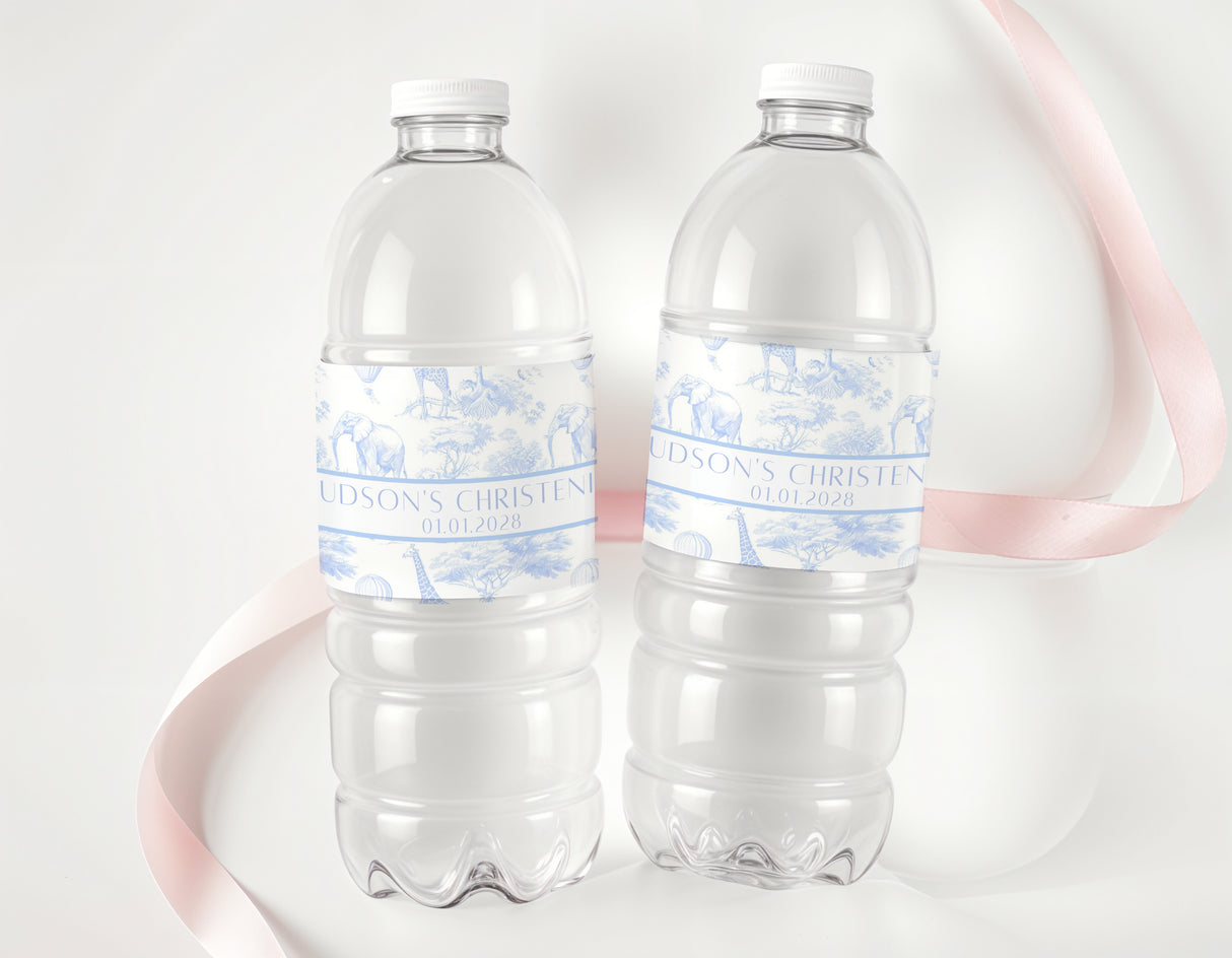 Clear water bottles with blue personalised christening labels