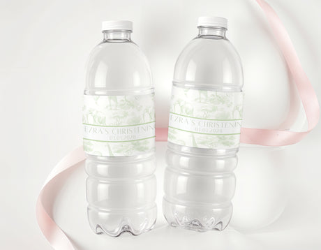 Set of two clear drink bottles with green personalised christening labels and caps