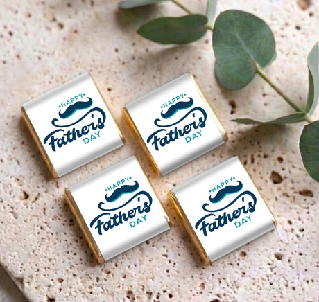 Set of four mini chocolates with silver wrappers and 'Happy Father's Day' moustache print