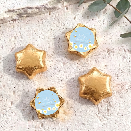 Gold foil chocolate stars with one personalised printed blue label