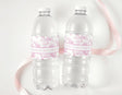 Personalised first birthday water bottle labels on clear plastic bottles, pink safari print