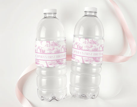 Personalised first birthday water bottle labels on clear plastic bottles, pink safari print