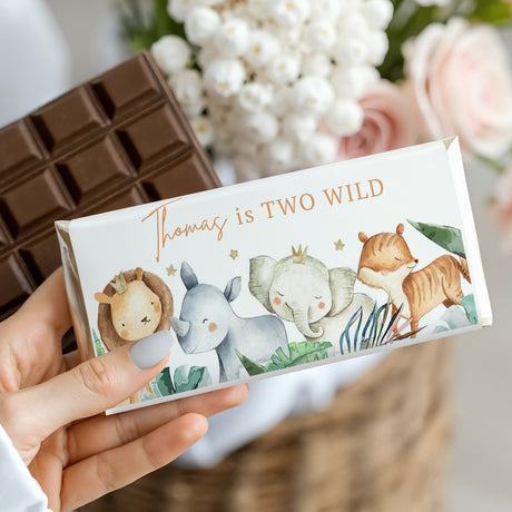 Chocolate bar wrapper with safari animal illustrations and 'Two Wild' text