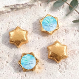 Personalised foil chocolate stars in gold with baptism label and cross design