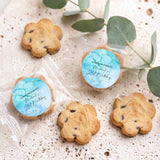 Chocolate chip cookie bags with blue birthday stickers, assorted shapes