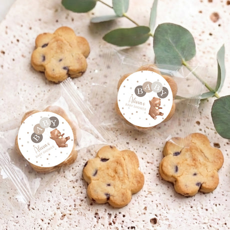 Baby shower choc chip cookies with round bear 'Alissa' labels on wrapped cookies