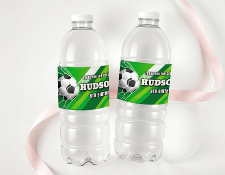 Soccer birthday water bottle labels on two clear plastic bottles with green soccer-themed decals