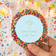 Bead-covered circular First Holy Communion gift bag with light blue round card and gold cross