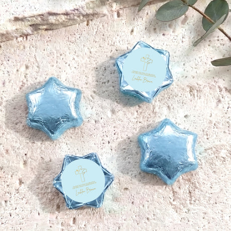 Blue foil-covered chocolate star sweets with cross label, personalised for First Holy Communion