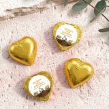 Foil-covered chocolate hearts in gold with birthday label featuring a construction truck