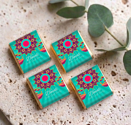 Set of personalized mini chocolate packs with teal Diwali mandala and pink center