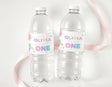 Two clear plastic drink bottles with purple 'OLIVIA ONE' label