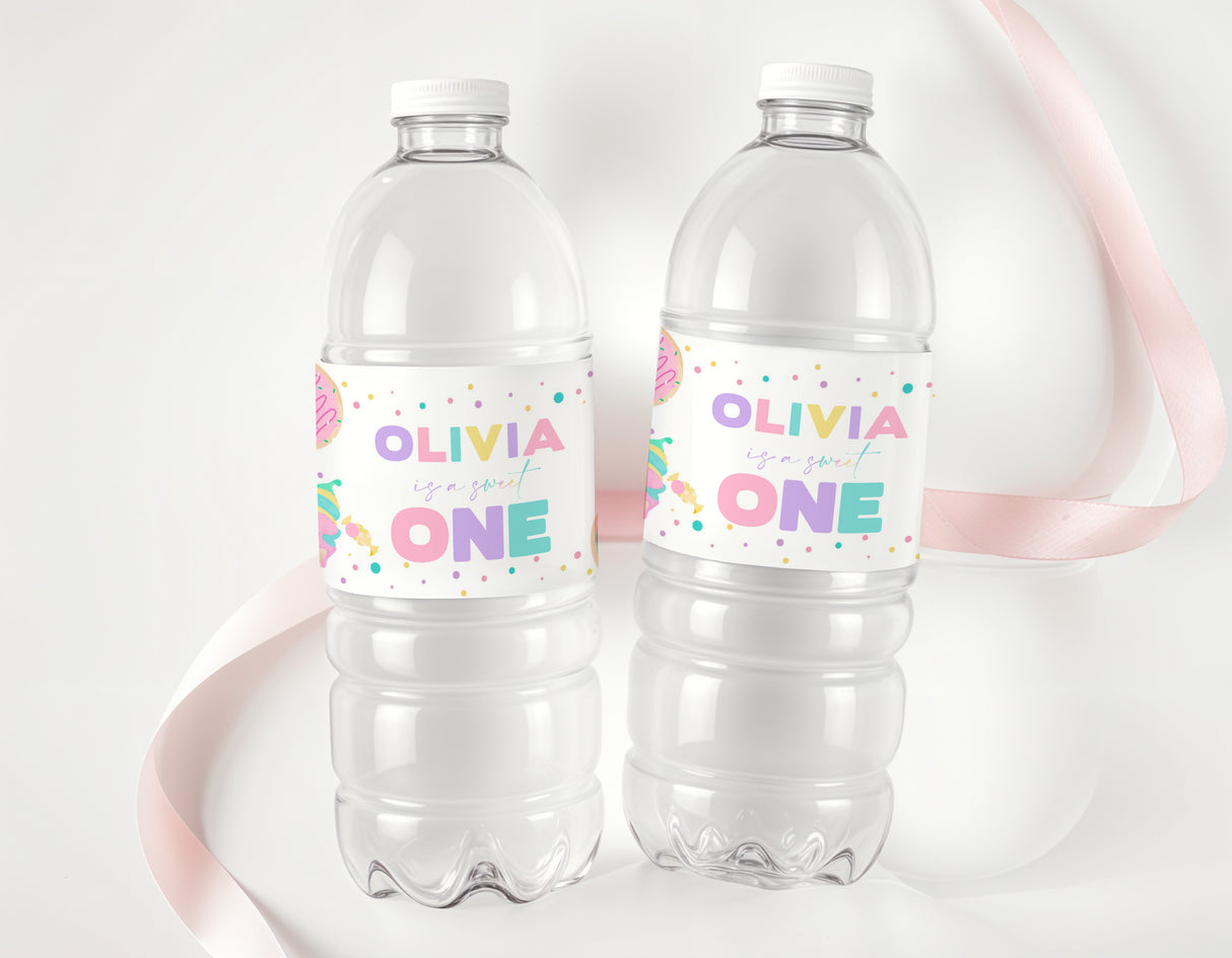 Two clear plastic drink bottles with purple 'OLIVIA ONE' label