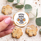 Chocolate chip cookies in clear bags with Cheers & Beers 100 Years round topper
