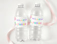 Personalised water bottle labels on two clear plastic bottles with 'WILLOW' and 'THREE' confetti