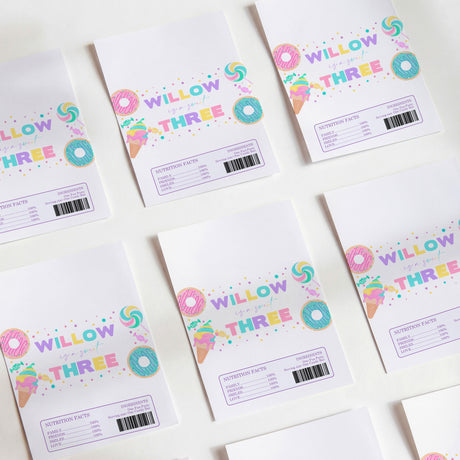 Birthday chocolate wrappers with colorful “Willow Three” donut graphic and multicolor accents