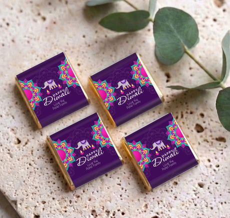 Set of purple mini chocolate favors with elephant and Happy Diwali text